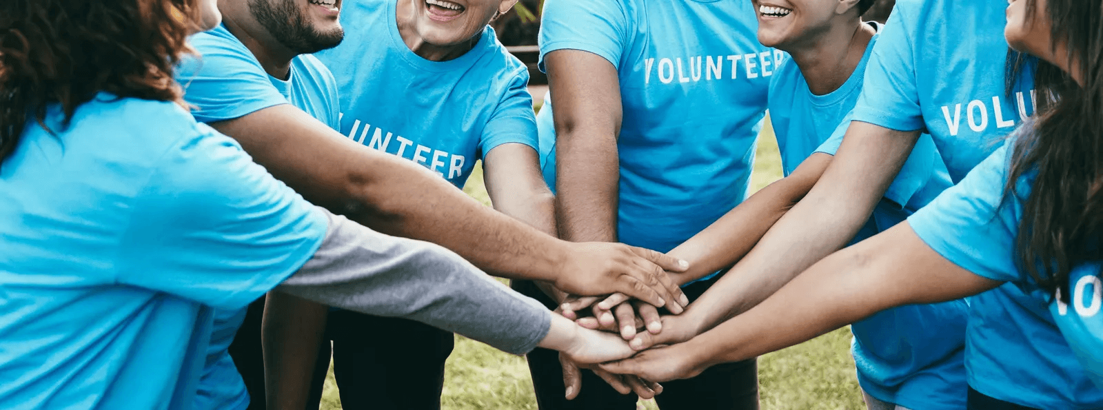 Volunteers huddled together