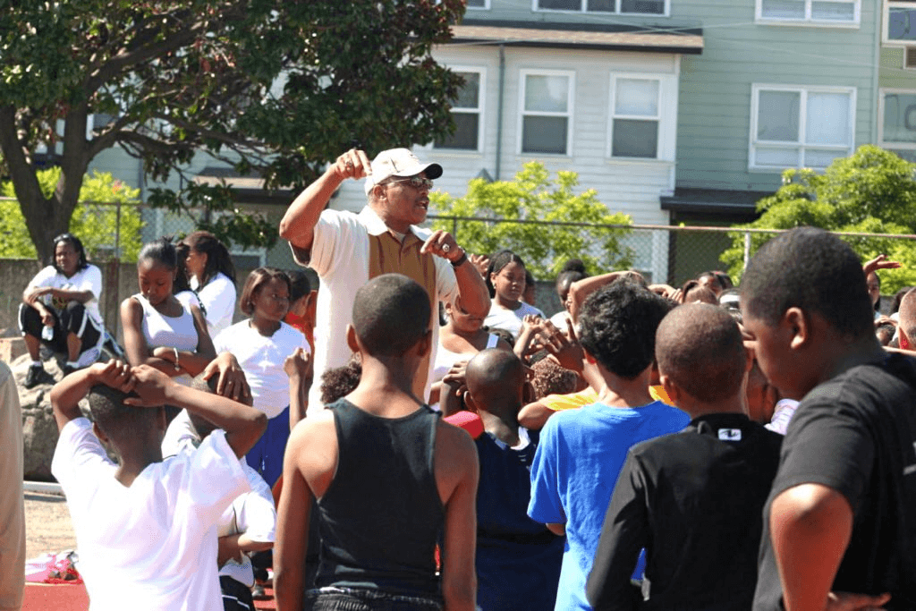 Man speaking to volunteers